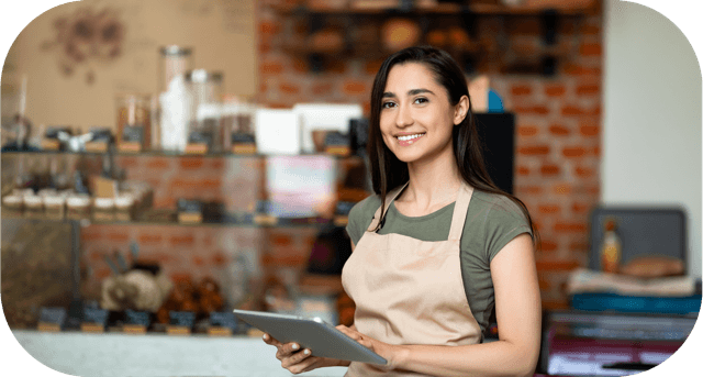 Hero Image. A small business owner in her restaurant