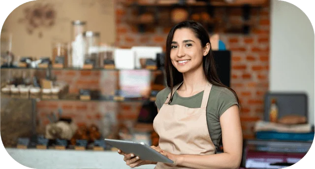 Hero Image. A small business owner in her restaurant